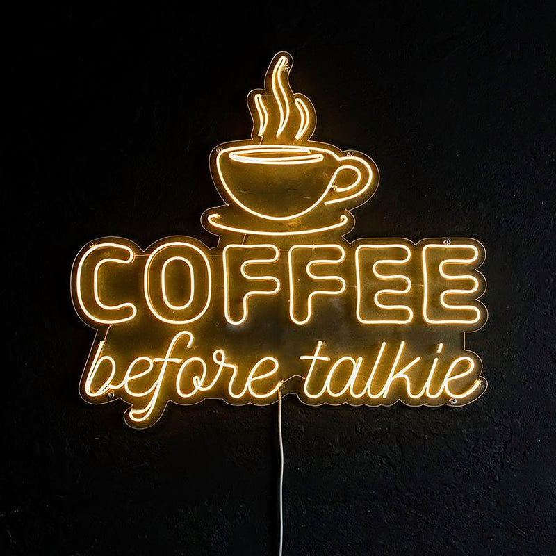 Insegna luminosa al neon "Coffee before Talkie"